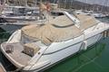 Jeanneau Prestige 34 Vista general exteror con la lona de fondeo
