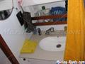 Dufour 36 CC Bañera central Baño