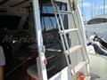 Rodman 870 Fly escalera