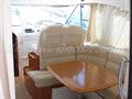 Beneteau Antares 12 Mesa del salon 