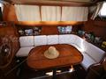 Belliure Endurance 35 Ketch Panoramica dinette con cortinas 